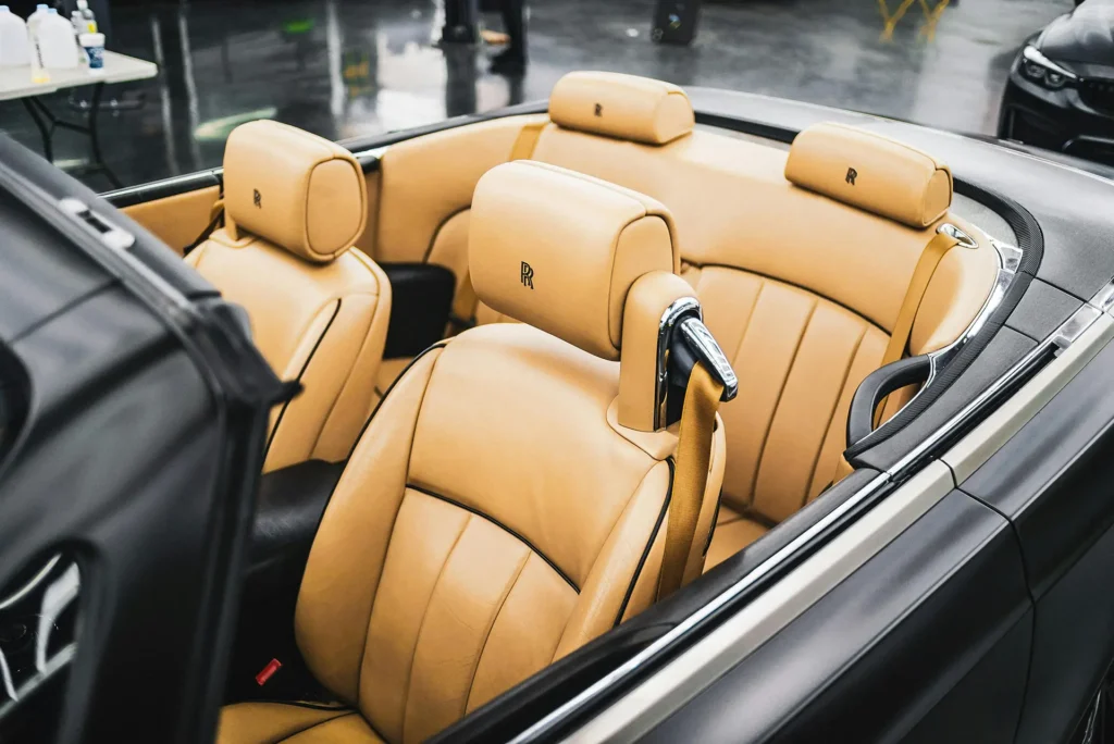 custom upholstery shop Wisconsin tan leather car seats in a convertible